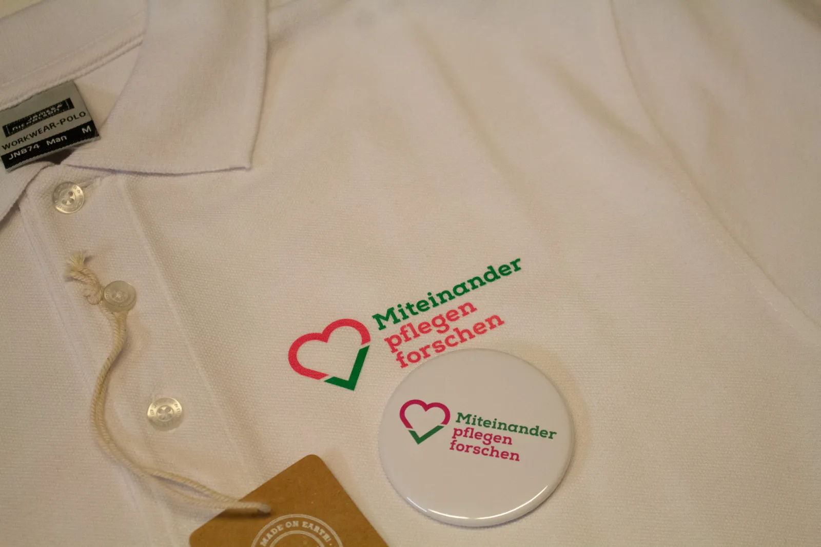Caritas & Med Uni - Poloshirts — Bild 6