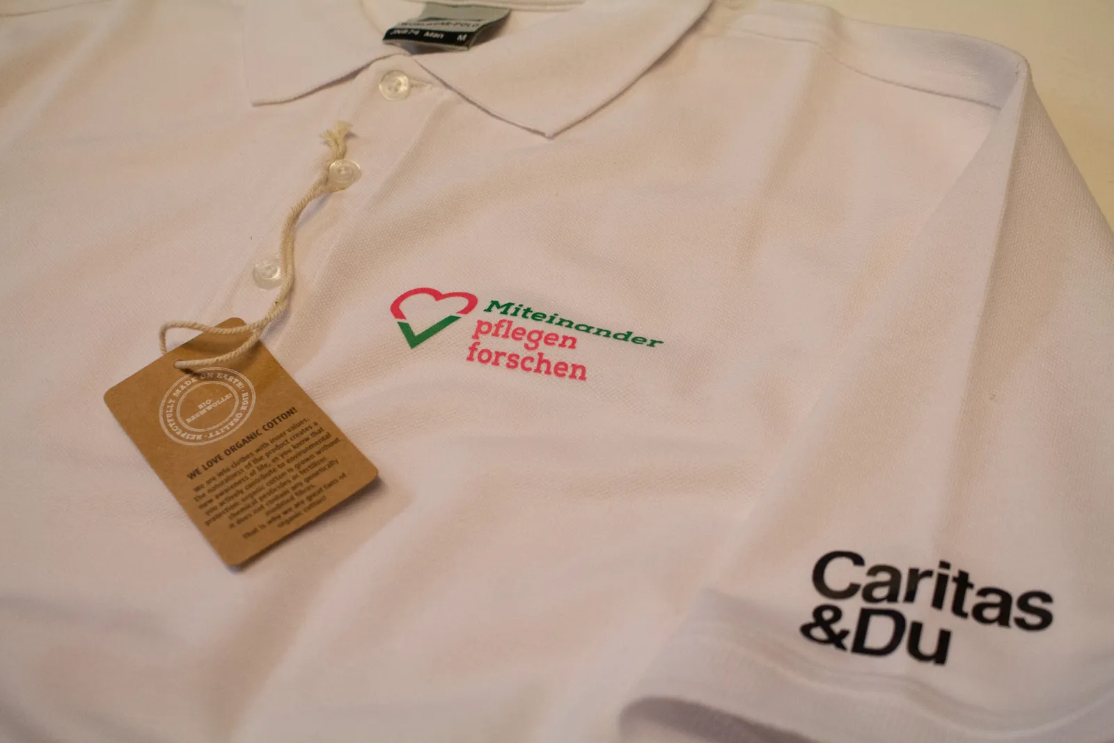 Caritas & Med Uni - Poloshirts — Bild 4